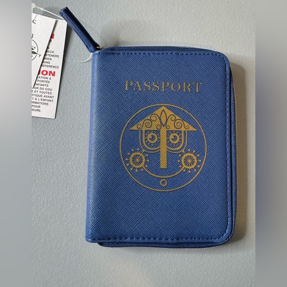 Disney Handbags - Disney parks it’s a small world Blue and Gold Passport zippered Wallet holder